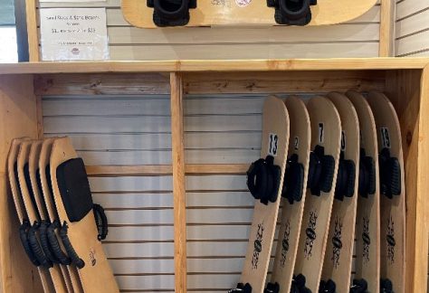 sandboards on the shelf at the visitor center