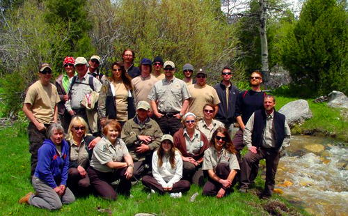 staff outside by creek