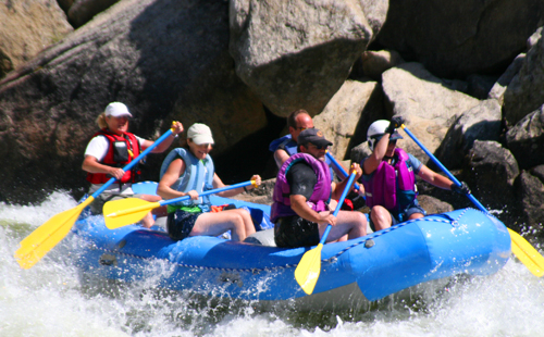 people on water water raft