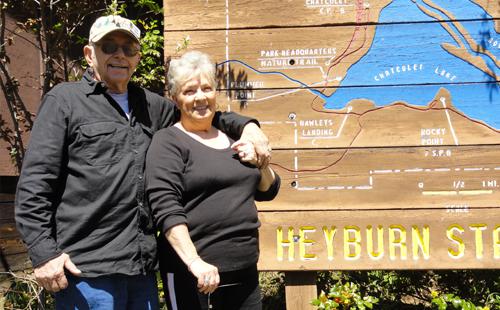 Volunteers posing in front of Heyburn sign
