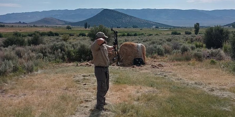 Person practicing archery at the Castle Rocks range
