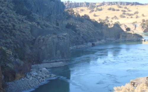 view of massacre rocks hills and river